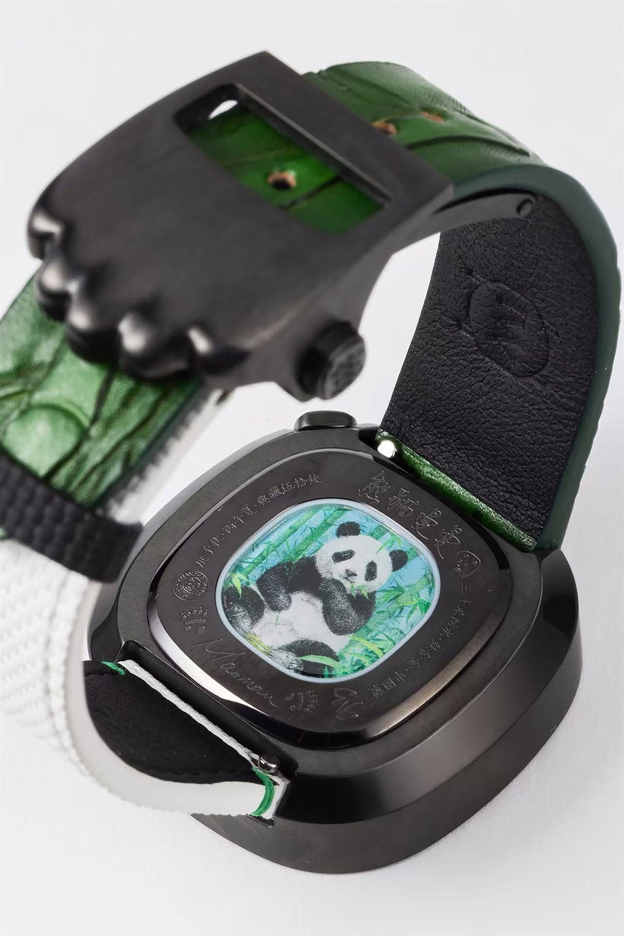 Back view of Manman Panda watch and pendant